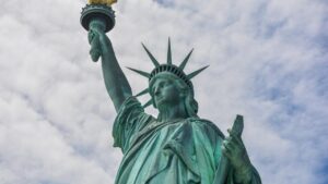 Statue of Liberty in New York Under a Cloudy Sky